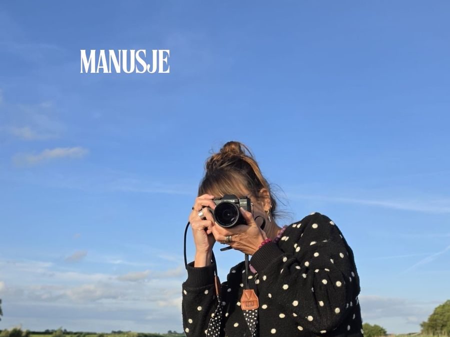 Roos aan het fotograferen vanaf de sloep